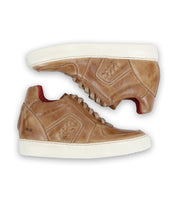 A pair of Bed Stu Andromeda brown leather high-top sneakers with white soles, featuring a street-smart design, viewed from the side against a plain white background.