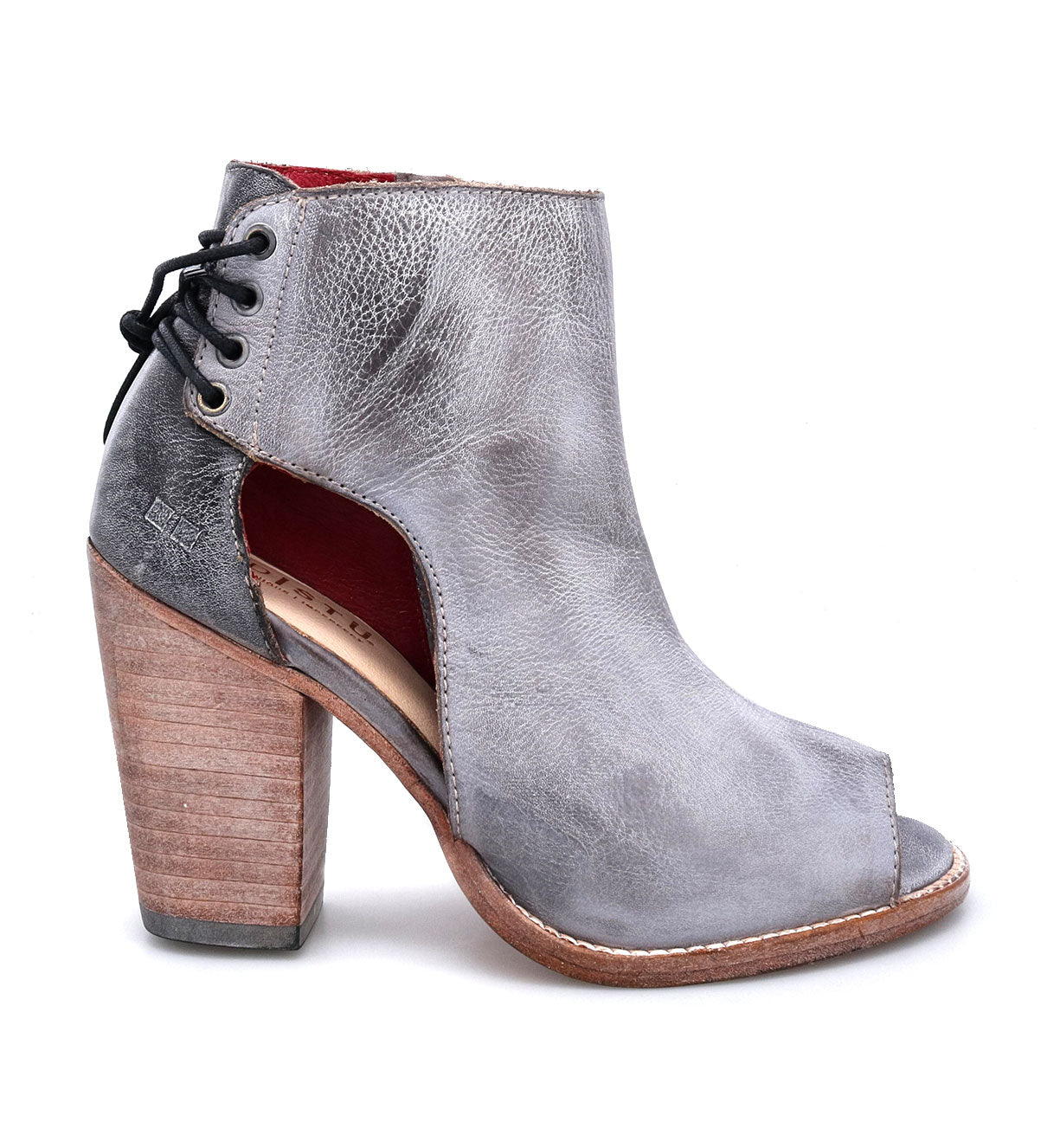 An Angelique ankle boot from Bed Stu, made of grey leather with a wooden heel.