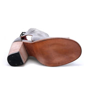 A pair of Angelique grey leather shoes with a wooden heel from Bed Stu.