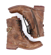 A pair of Anne brown boots with metal buckles from Bed Stu.