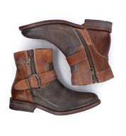 A pair of Becca boots by Bed Stu, made of brown leather and featuring a zipper on the side.
