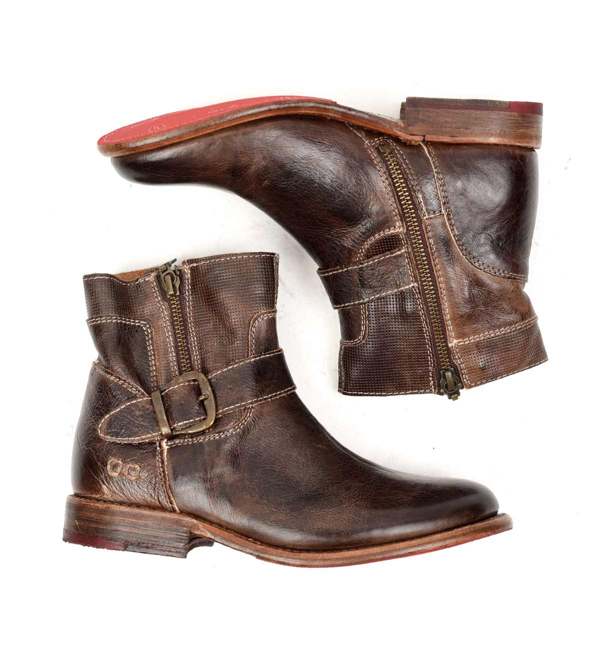 A pair of Becca brown leather boots with red soles by Bed Stu.