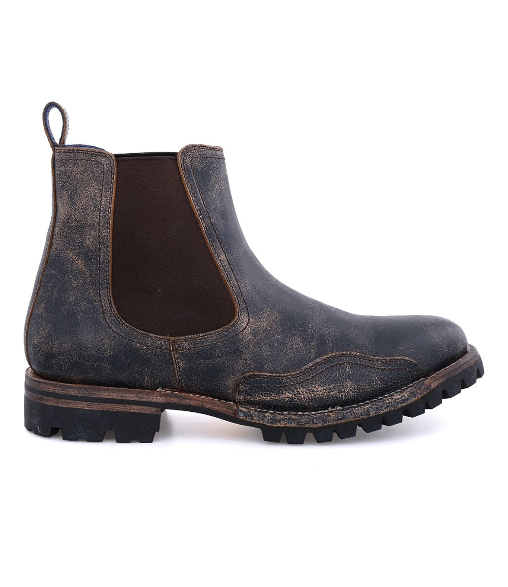 Side view of a distressed leather Bed Stu Brady Trek Chelsea boot with elastic side panels and a Vibram outsole, isolated on a white background.