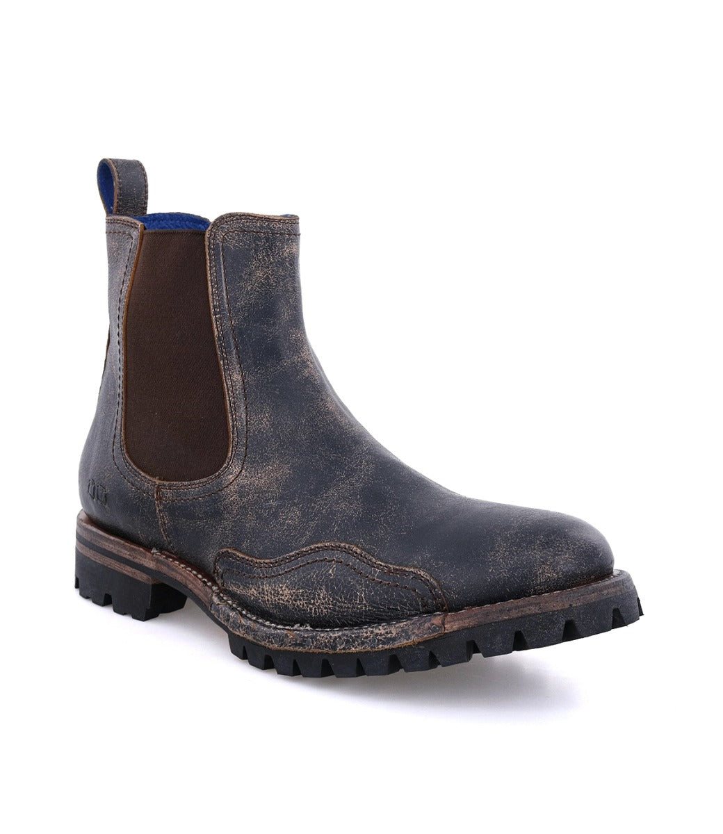 A single distressed leather Bed Stu Brady Trek Black Lux Boot with elastic side panels and a Vibram outsole, isolated on a white background.