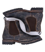 A pair of worn brown leather Brady Trek Chelsea boots with a Vibram outsole and elastic side panels, viewed from above on a white background.