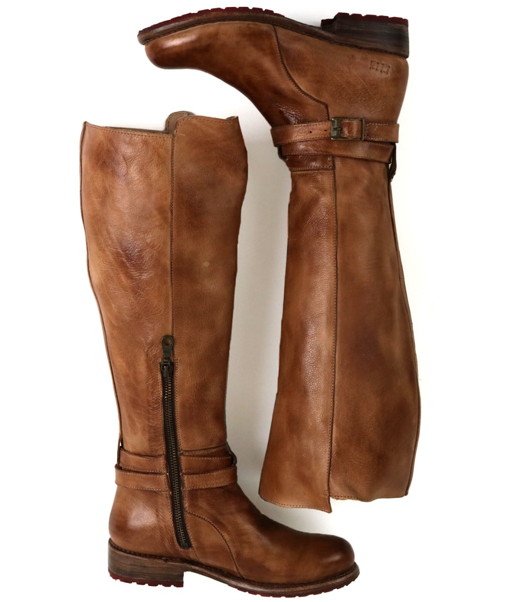 A pair of Bed Stu Bristol Wide Calf boots with zippers on the side.