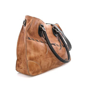 A Bruna leather handbag by Bed Stu with black handles.