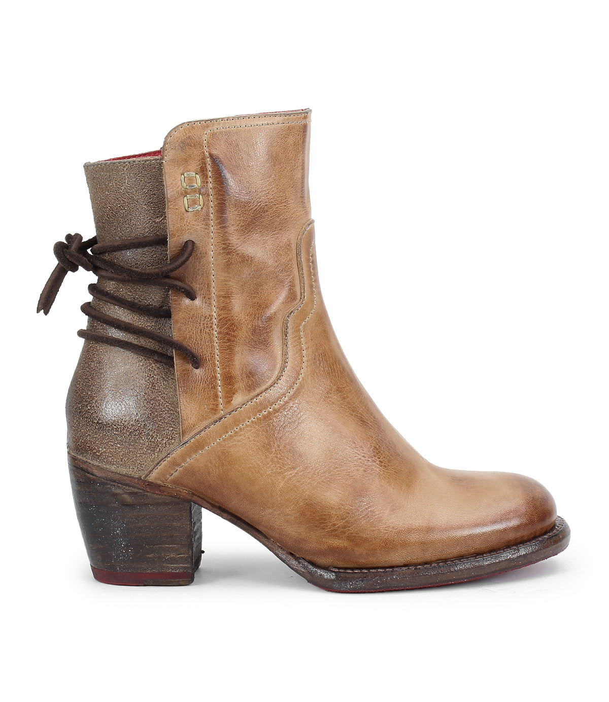 The Cable boot by Bed Stu is a brown, hand-finished leather mid-ankle style with a stacked heel, decorative stitching, and dark laces wrapping the back for Western flair.