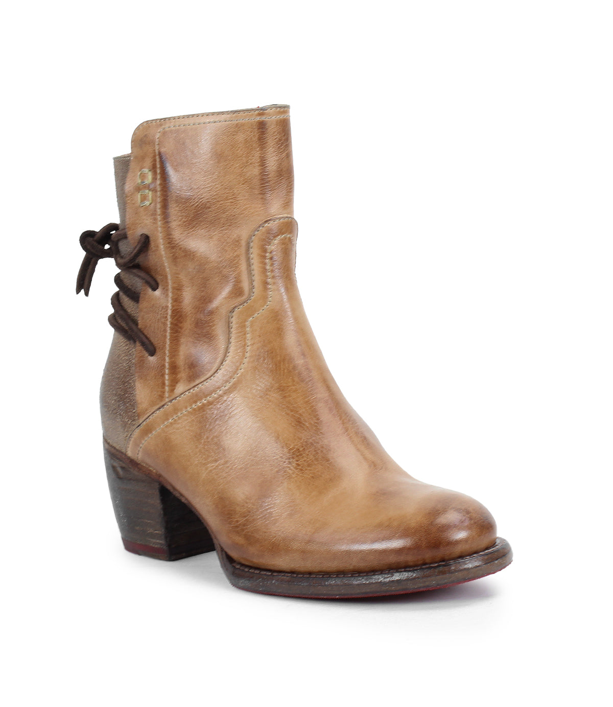 The Bed Stu Cable is a tan hand-finished leather mid-ankle boot featuring a medium block heel, decorative side stitching, and lace detail on the back for subtle Western flair.
