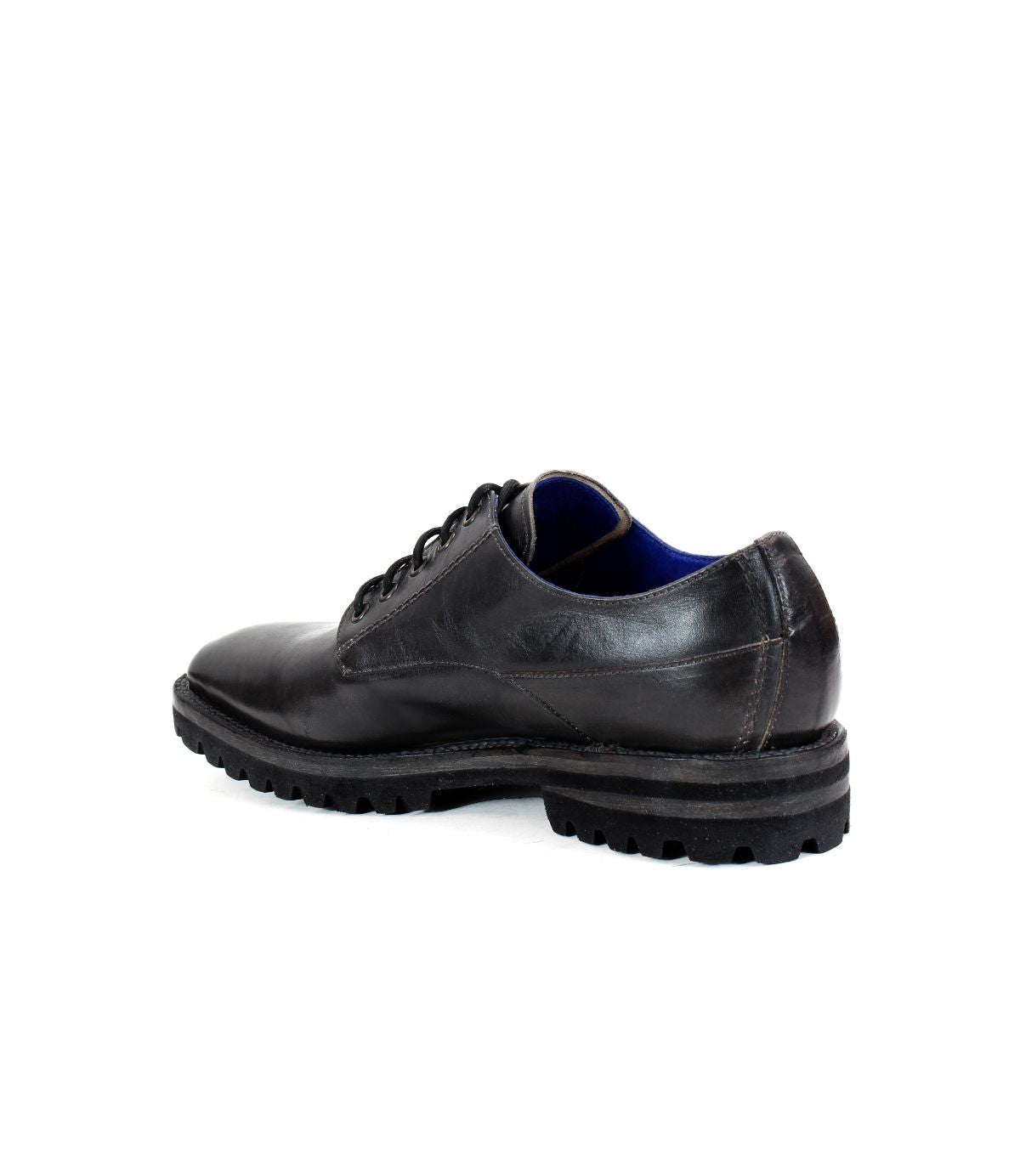 A single black leather men's oxford shoe named Carter by Bed Stu, featuring a rugged rubber sole and Goodyear welt construction, viewed from the back and side.