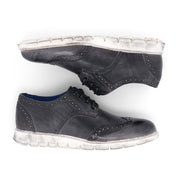 A pair of Bed Stu Cayuga II wingtip shoes on a white background.