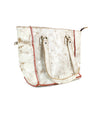 A white and brown marbled Bed Stu Celindra LTC tote bag with red stitched accents, featuring two handles and a side zipper secret pocket.