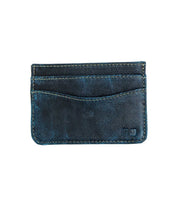 The Chuck by Bed Stu is a worn, dark blue leather card wallet featuring multiple card slots and visible stitching. Presented on a white background, it offers a compact and convenient solution for your everyday essentials.