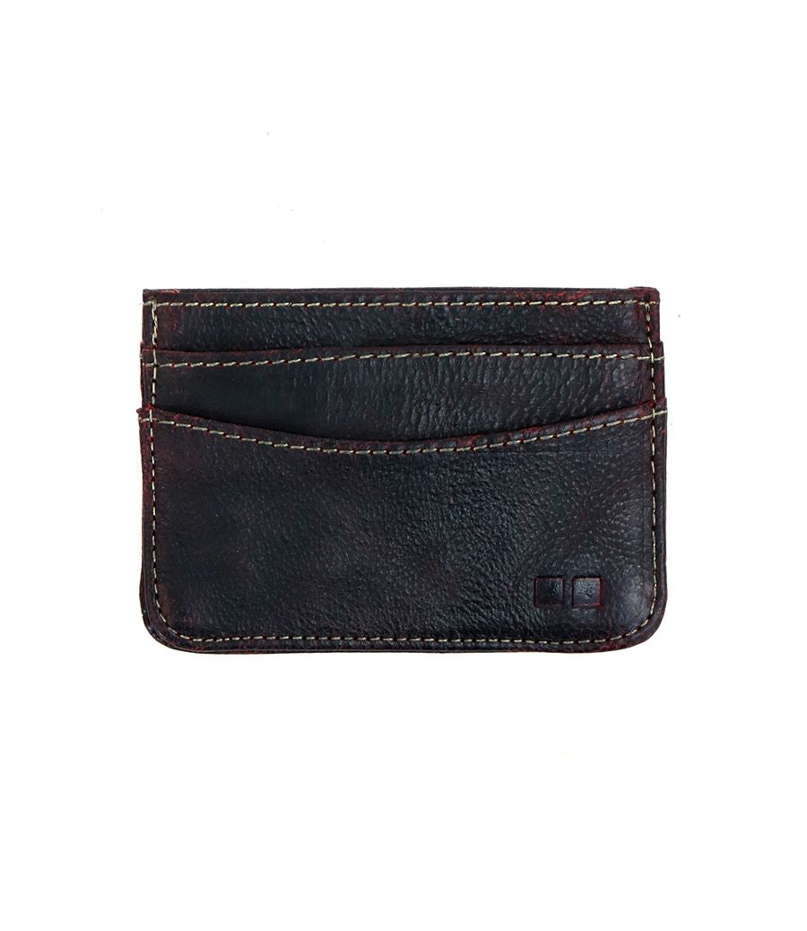 The Chuck card wallet by Bed Stu is a convenient and compact black leather accessory, featuring three visible slots and eye-catching red stitching details.