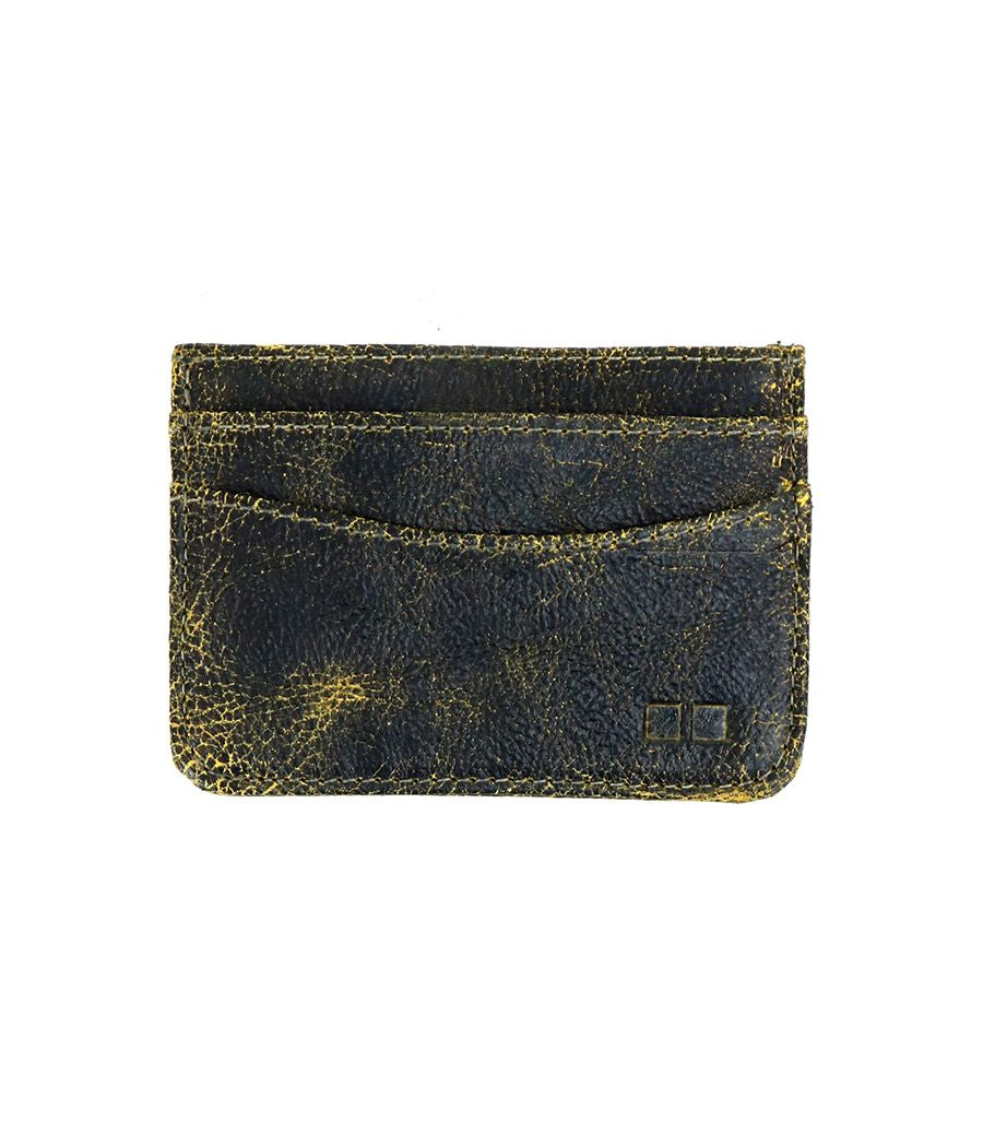 The Chuck by Bed Stu is a small, rustic brown leather cardholder with three slots and visible wear, offering both style and convenience in a compact design.