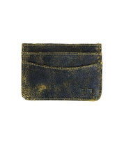 The Chuck by Bed Stu is a small, rustic brown leather cardholder with three slots and visible wear, offering both style and convenience in a compact design.