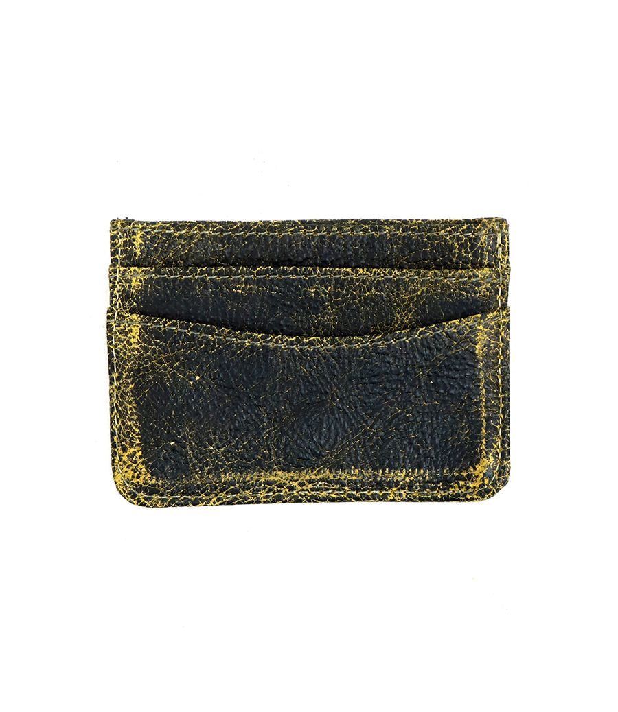 The Chuck by Bed Stu is a compact, worn dark leather card wallet with multiple slots, offering a convenient and stylish option for those seeking efficiency.
