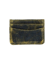 The Chuck by Bed Stu is a compact, worn dark leather card wallet with multiple slots, offering a convenient and stylish option for those seeking efficiency.