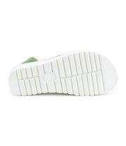 The image displays the Clancy shoe by Bed Stu, featuring a white sole with horizontal and vertical grooves. The green upper is highlighted with metal grommets. It boasts an XL EXTRALIGHT platform sole for added comfort.
