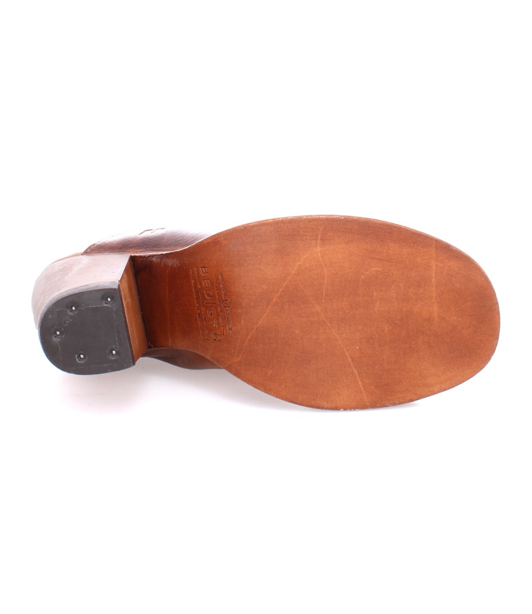 A Clavel brown leather shoe with a black sole by Bed Stu.