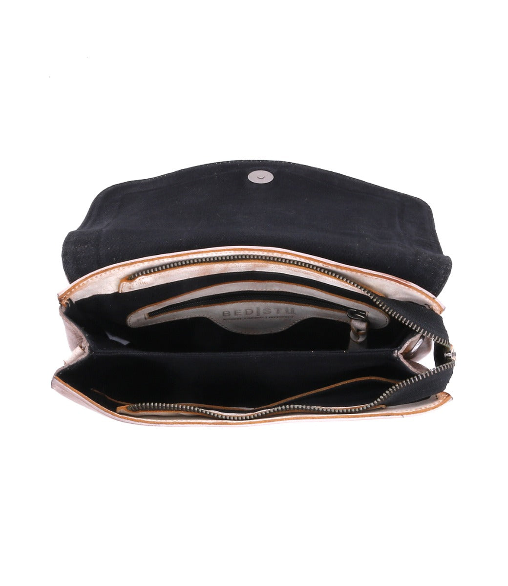 Inside the leather Cleo crossbody bag with straps and studs by Bed Stu.