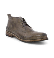 A pair of Clyde men's brown leather chukka boots by Bed Stu.