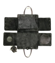 A Bed Stu Commuter, a multifunctional black leather bag with two compartments, perfect for commuters. Comes with a key ring and can accommodate laptops up to 15 inches.