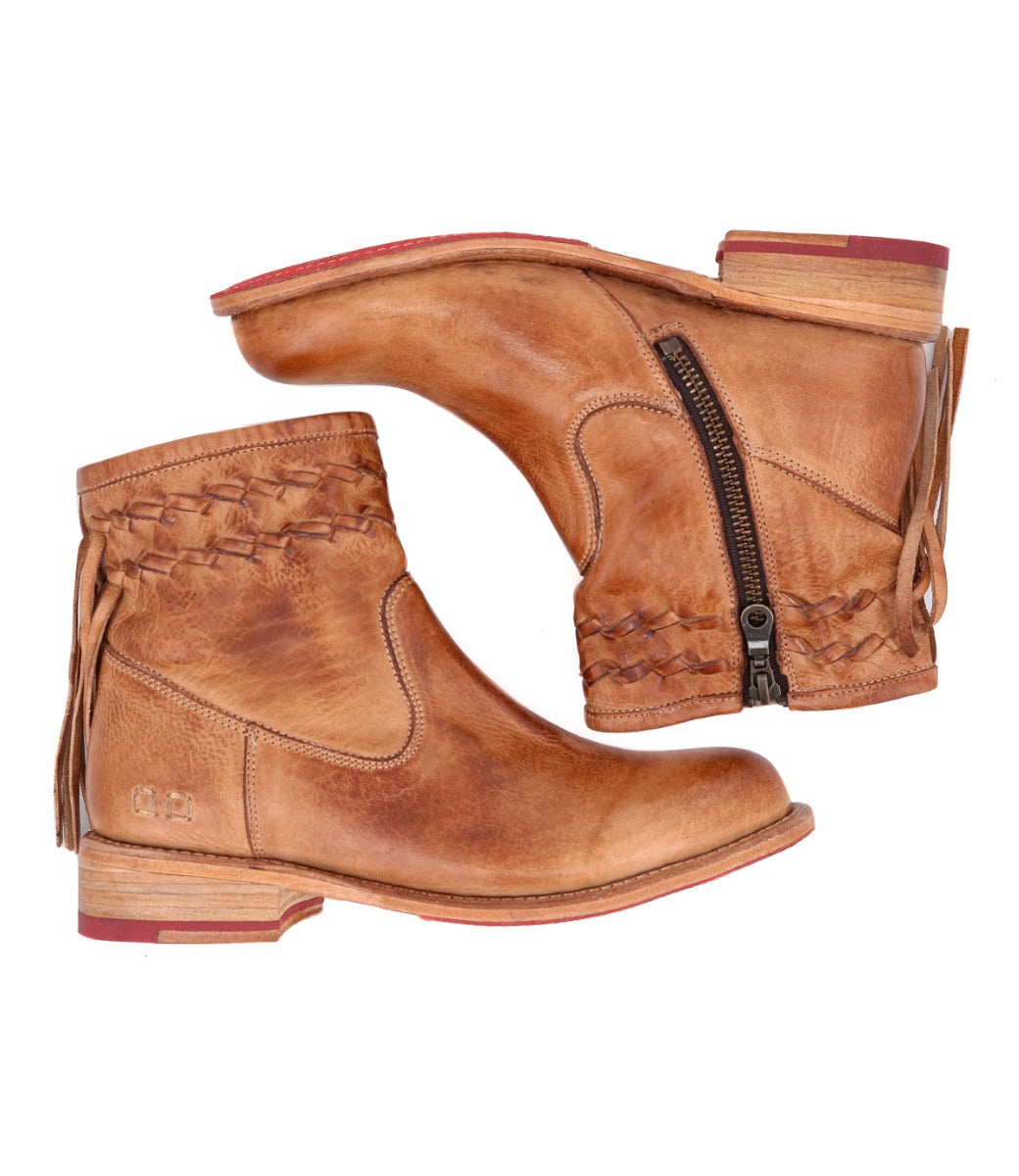 A pair of Craven Bed Stu tan leather ankle boots.