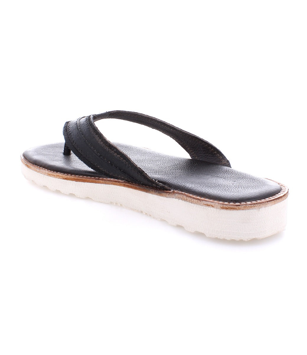 A pair of Bed Stu Elias Light flip flops on a white background.