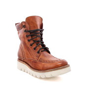 A women's brown leather Elisha II boot with a white sole by Bed Stu.