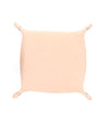 An Expanse beige leather pillow on a white background.