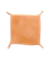 Tan-colored leather Expanse Catchall Tray by Bed Stu with four small corner flaps, perfect for holding loose change and keys.