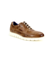A men's brown leather lace-up shoe with intricate details by Bed Stu Fairman.