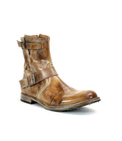 Bed Stu's Fellow boot features a moto-inspired design with two side buckles, a textured sole, and rugged brown leather appeal.