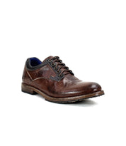 The Fierce men's derby shoe by Bed Stu in brown leather, featuring black laces against a white background, effortlessly blends timeless appeal with modern flair.
