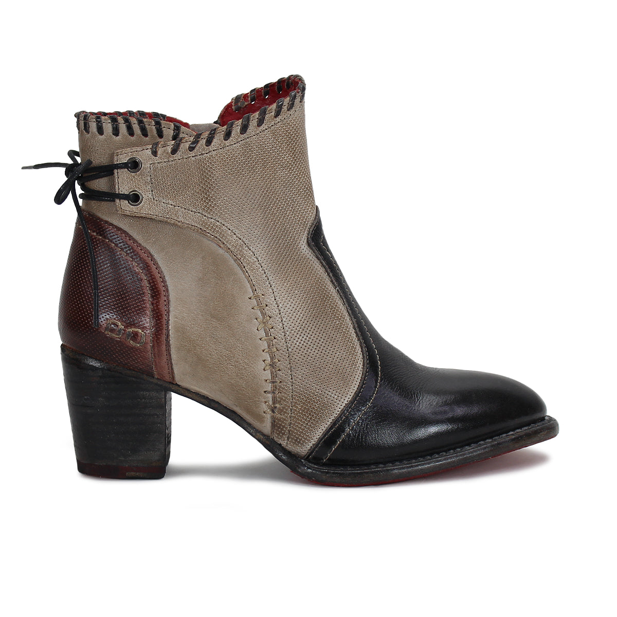 A women's Bia ankle boot in beige and black by Bed Stu.