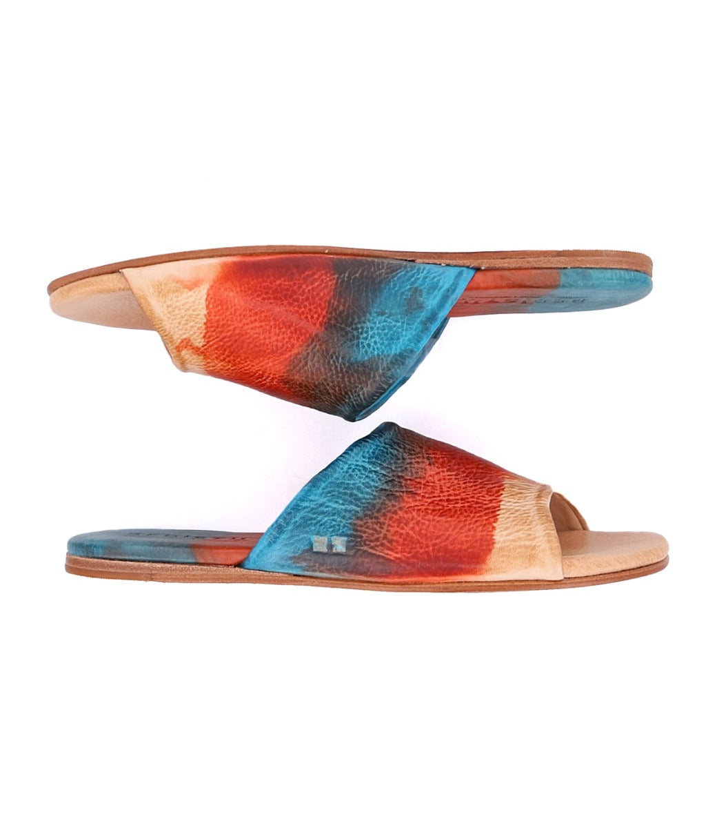 A pair of Gia colorful leather slide on sandals by Bed Stu.