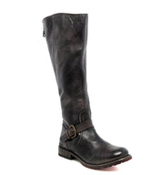 A women's black leather Bed Stu riding boot with buckles.