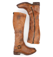 A pair of Glaye brown leather boots with buckles and zippers from Bed Stu.