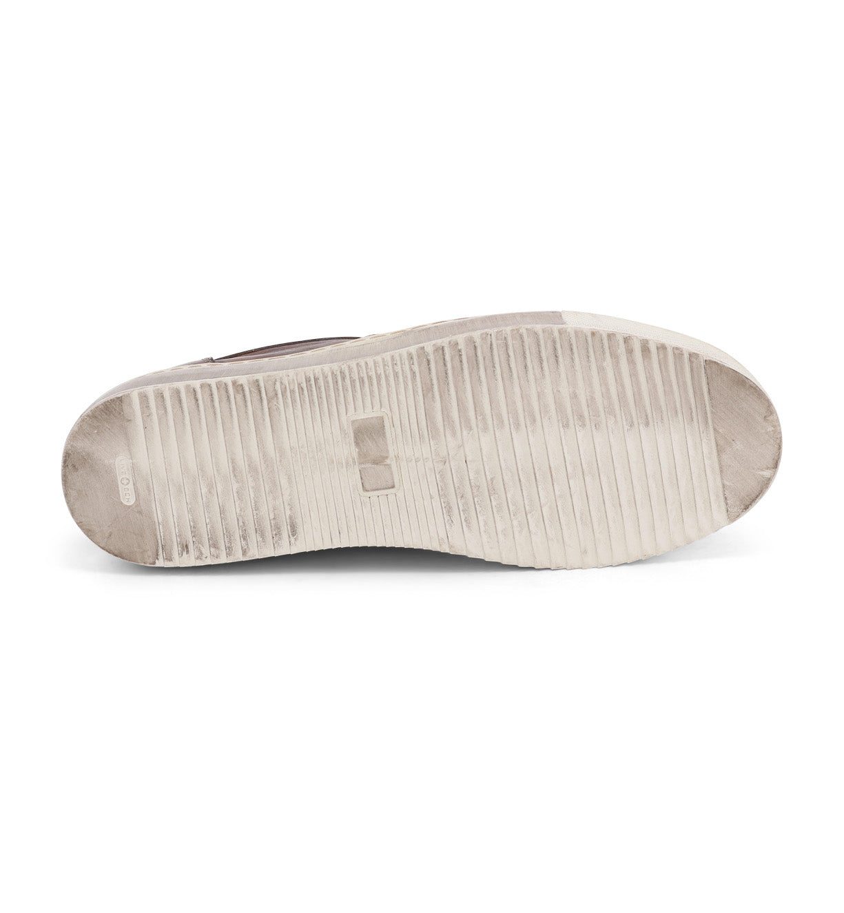 A pair of Harry sneakers with white soles on a white background by Bed Stu.