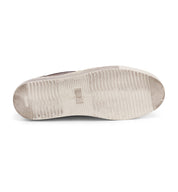 A pair of Harry sneakers with white soles on a white background by Bed Stu.