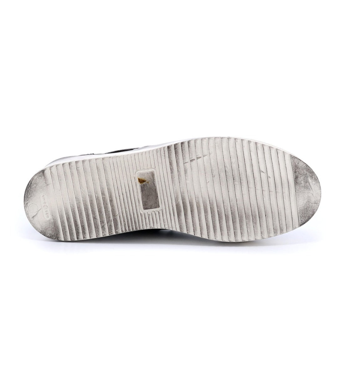 A pair of Hermione sneakers with a silver sole on a white background by Bed Stu.