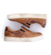 A pair of Bed Stu women's brown slip on sneakers named Hermione.