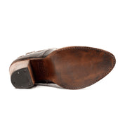 The sole of women's brown Isla ankle boot with a wooden heel, by Bed Stu.