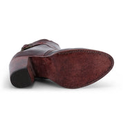 A pair of Isla brown leather boots with a buckle on the side by Bed Stu.
