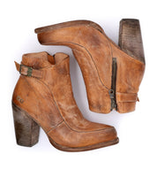 A pair of Isla Bed Stu tan leather ankle boots.