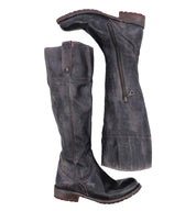 A pair of Jacqueline Wide Calf women's boots by Bed Stu with zippers on the side.