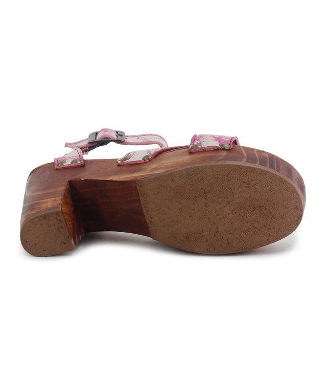 The Bed Stu Kalah is a wooden-soled sandal with pink floral straps and buckle closure, featuring a beige textured sole for a timeless elegance, showcased from the bottom view.