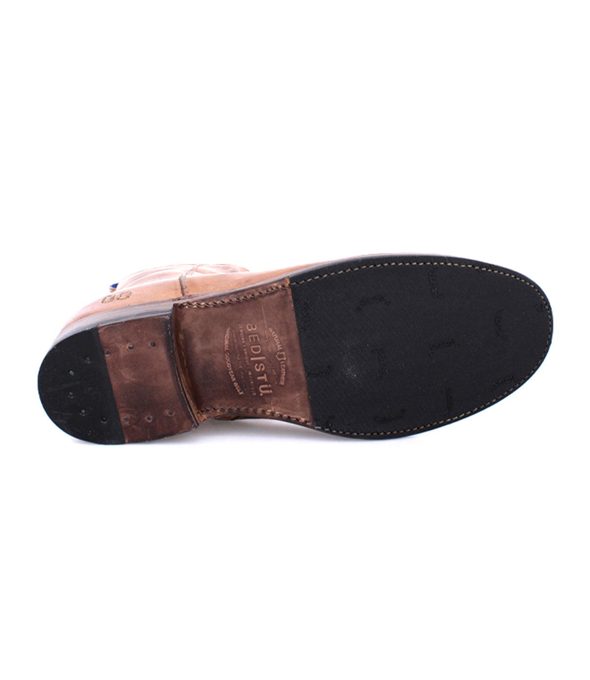 Bottom view of a Bed Stu Kaldi brown leather ankle boot with a partially rubberized sole, isolated on a white background.