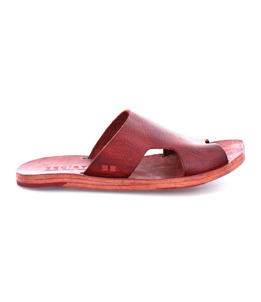 A Bed Stu Karine red leather sandal on a white background.